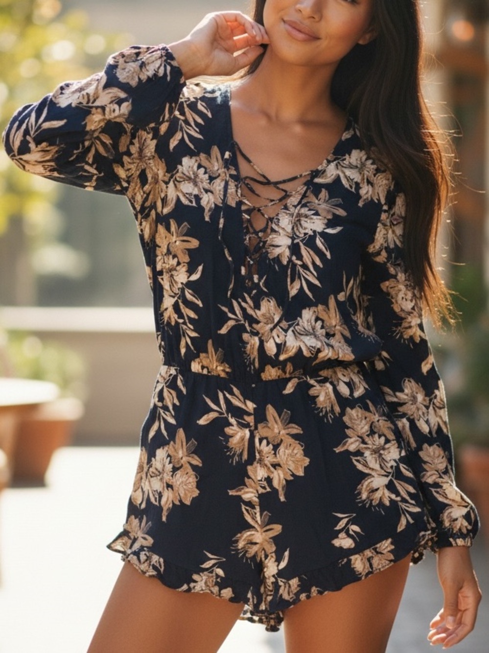 Stella Laguna Beach Navy Blue Romper with Beige Floral Print